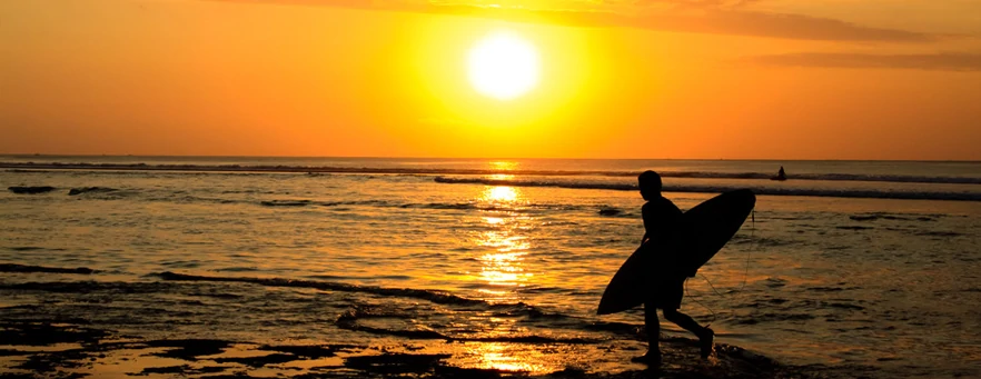 kuta beach surfer
