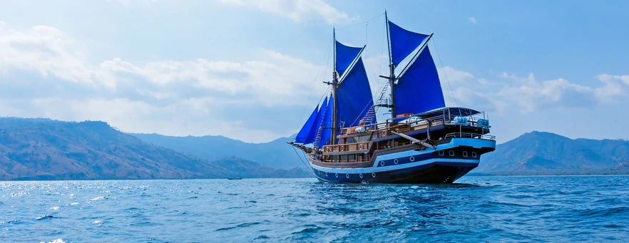 ship with blue sails