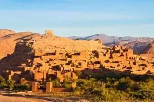 Ait Benhaddou,fortified city, kasbah or ksar, along the former caravan route between Sahara and Marrakesh in present day Morocco. It is situated in Souss Massa Draa on a hill along the Ounila River.